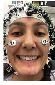 Amanda wearing an EEG cap