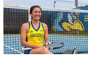 Amanda Studnicki as co-captain of the UD tennis team