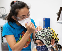 Amanda working with EEG cap